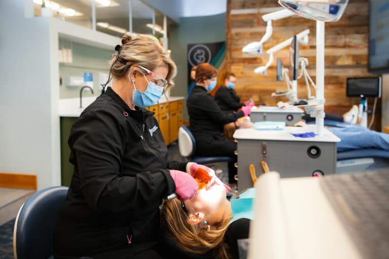 dentist perform adolescent treatment to patient Greg Brown Orthodontics