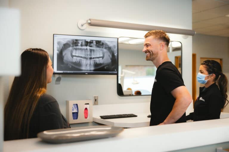 Greg Brown Orthodontics team doing a virtual smile assessment