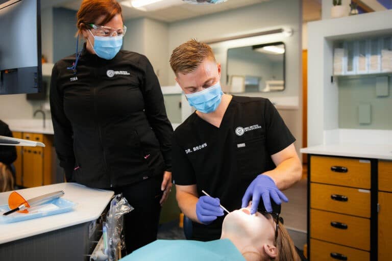 dentist performing orthodontic emergencies Greg Brown Orthodontics
